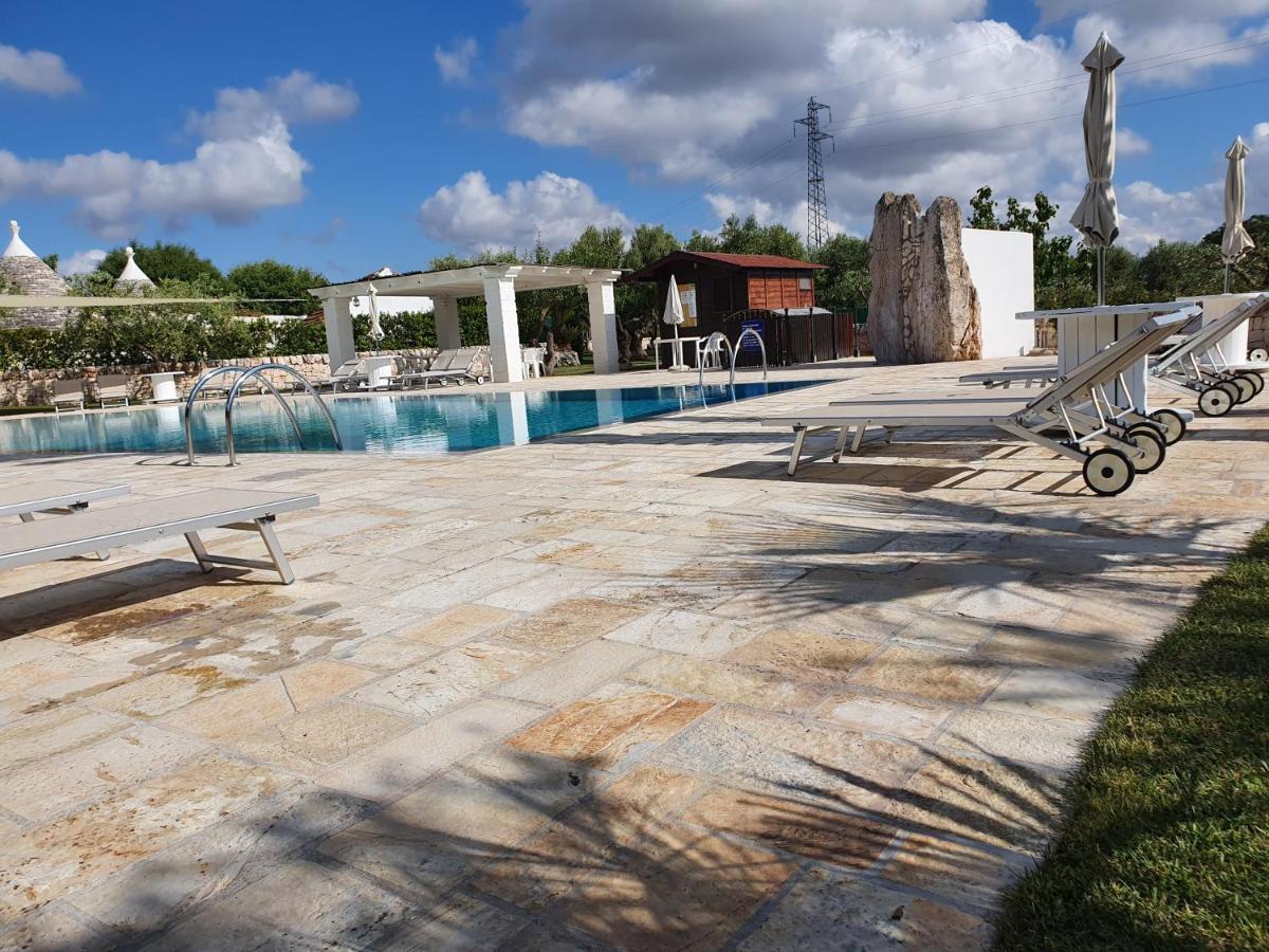 I Trulli Del Nonno Michele Guest House อัลเบโรเบลโล ภายนอก รูปภาพ