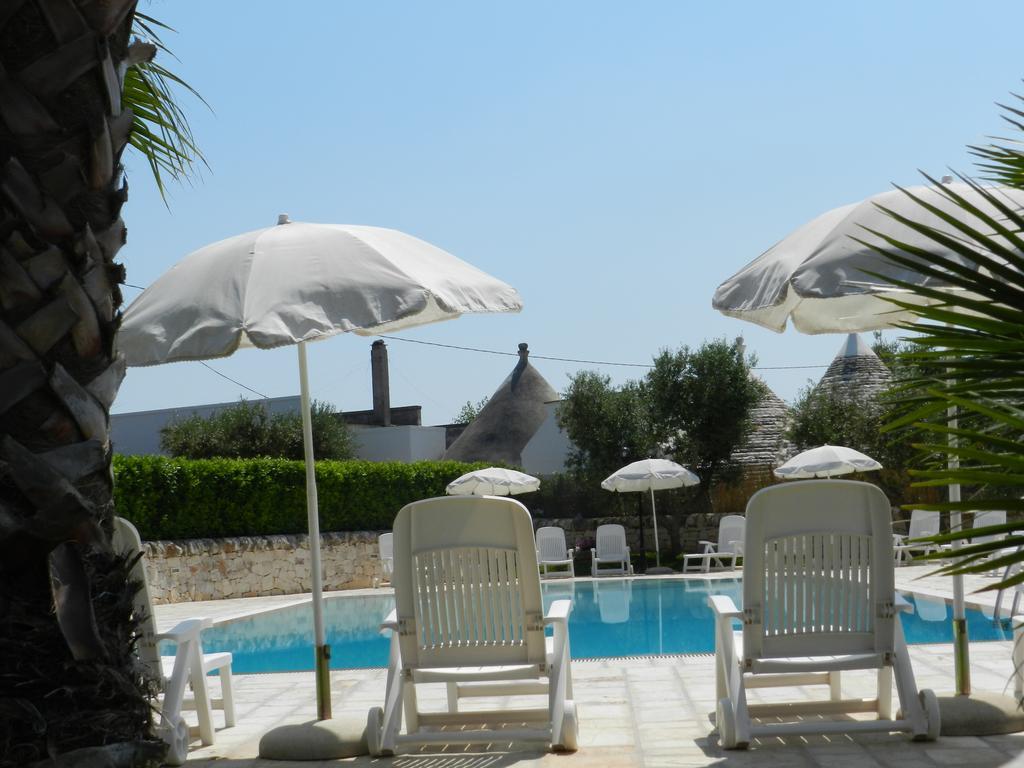 I Trulli Del Nonno Michele Guest House อัลเบโรเบลโล ภายนอก รูปภาพ