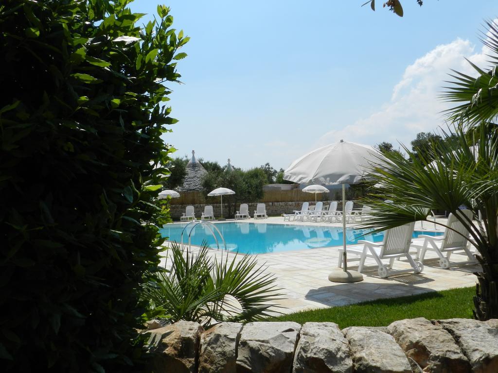I Trulli Del Nonno Michele Guest House อัลเบโรเบลโล ภายนอก รูปภาพ