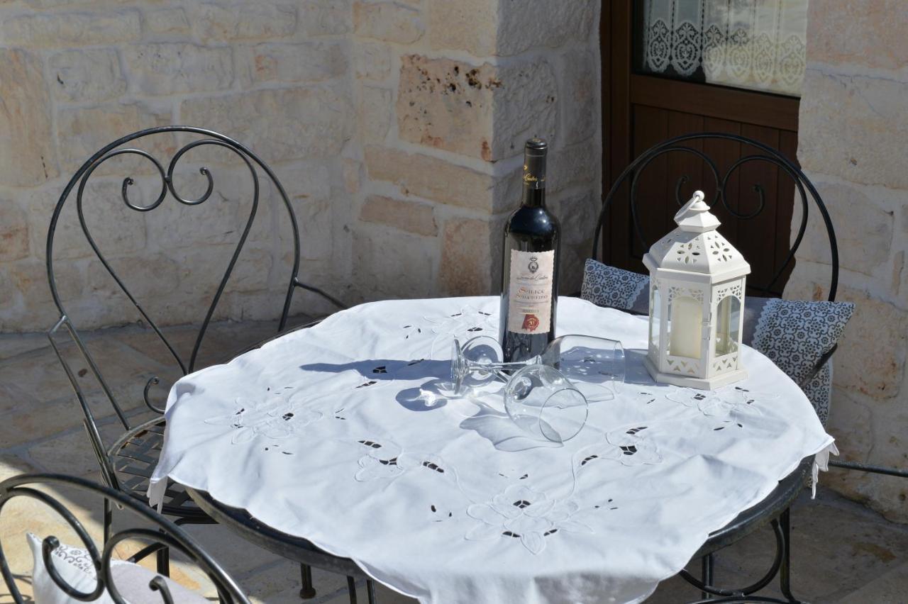 I Trulli Del Nonno Michele Guest House อัลเบโรเบลโล ภายนอก รูปภาพ