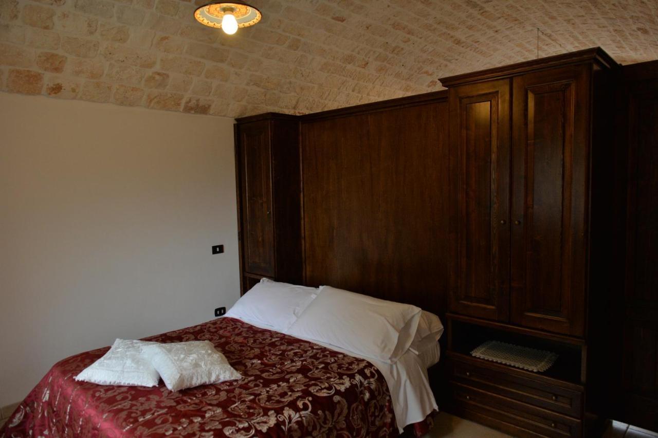 I Trulli Del Nonno Michele Guest House อัลเบโรเบลโล ภายนอก รูปภาพ
